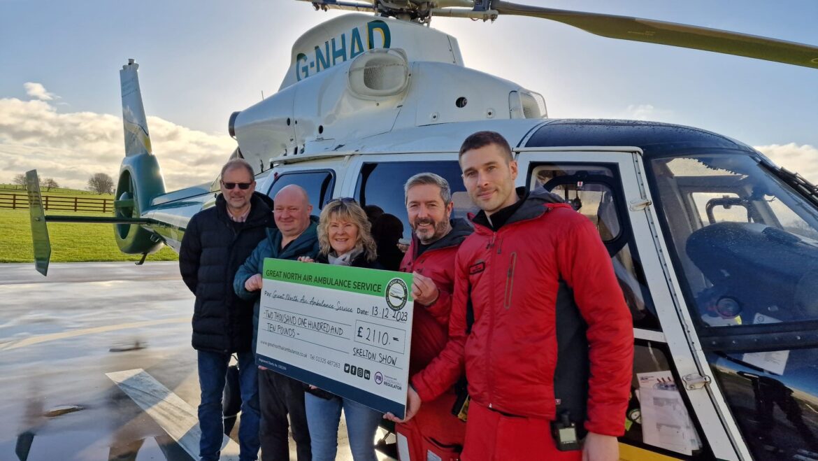 Skelton Show Committee hand GNAAS a cheque for £2,110.